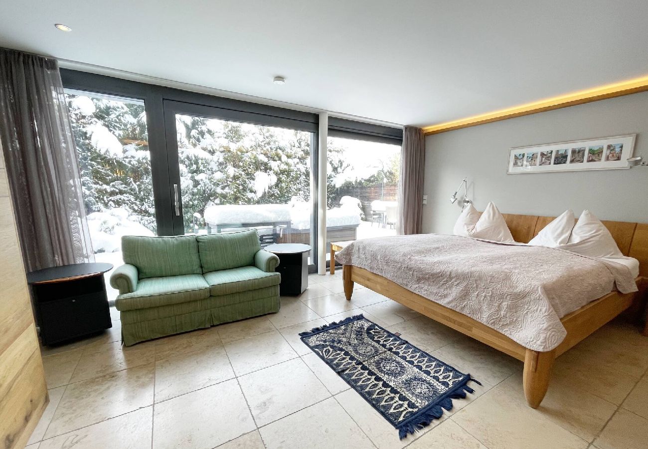 Ferienwohnung in Kirchberg in Tirol - Trendguide Garten Suite