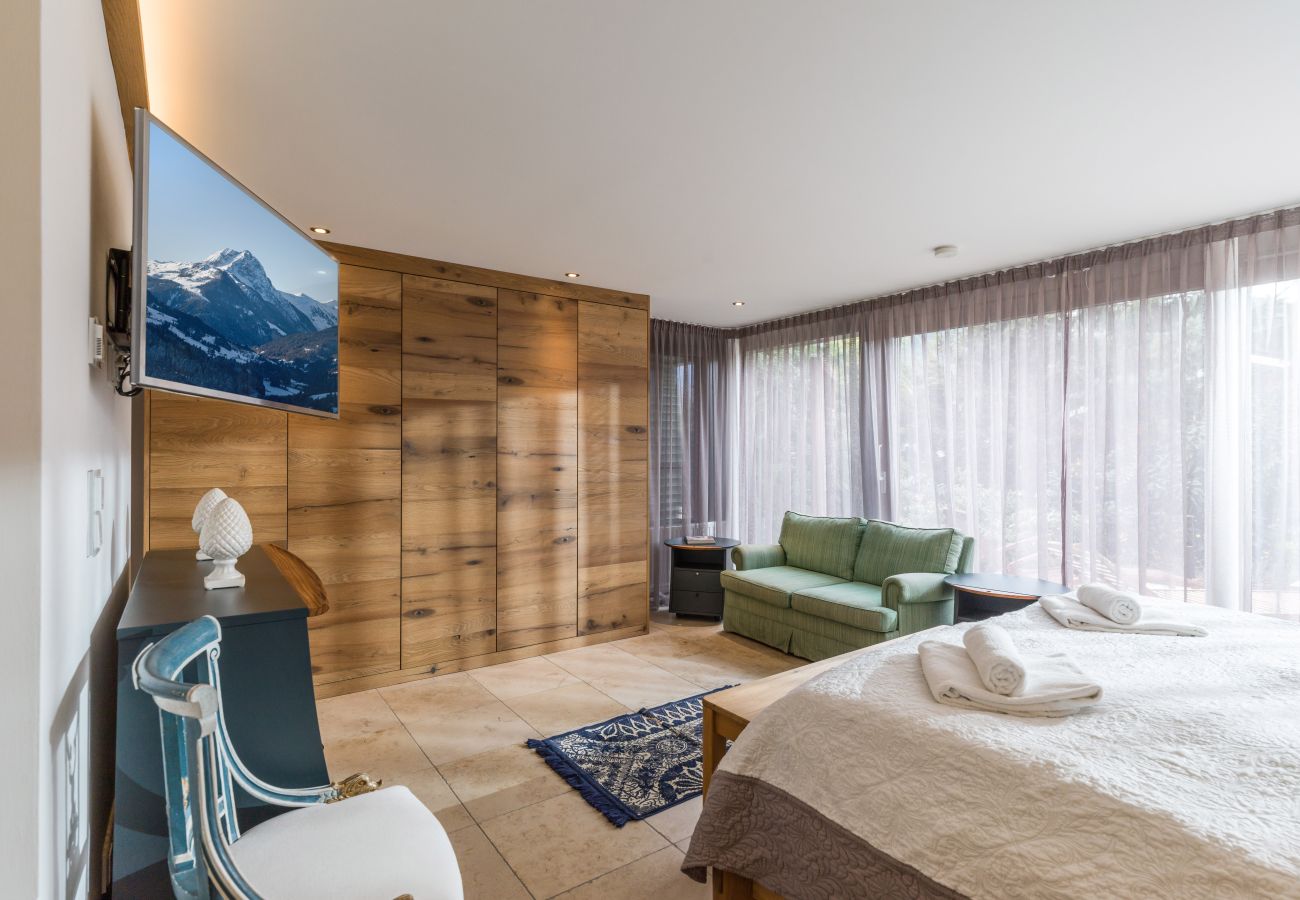 Ferienwohnung in Kirchberg in Tirol - Trendguide Garten Suite